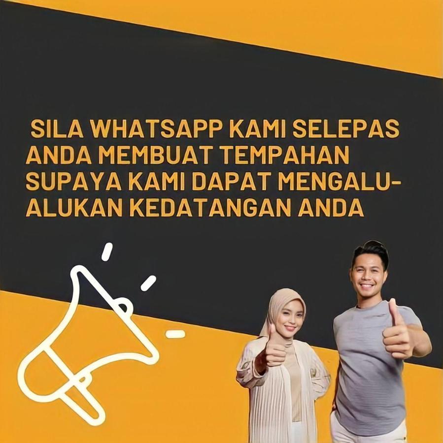 Sinar Rasa Homestay At I-Soho, I-City Шах-Алам Экстерьер фото A poster from the National Security Council of Malaysia, asking people to stop spreading fake news via WhatsApp.
